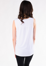 The Janice V-Neck Blouse is an easygoing tank and will be your favourite tank top for the warmer weather. The beautiful smock detailing at the shoulder is accentuated by a flattering V-neck. Made with signature organic viscose from bamboo that’s breathable and soft. Fabrication: 95% Viscose from Bamboo 5% Spandex TERRERA White $65.00