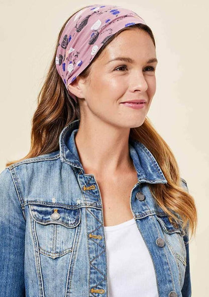 This Is J's Wide Headbands reverse from a unique print to a solid color. The fabric is ultra-soft and moisture-wicking and is soft enough to scrunch and fold into different widths. It comes twisted in the back for a comfortable tapered fit.  Made in Canada  Fabrication: 93% Viscose from Bamboo 7% Spandex. $16.00 palm leaf dusty rose pink