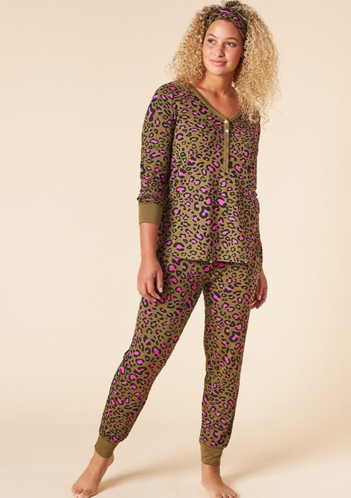 The Brandie Henley Harem Pajama Set is long a sleeved buttoned V neck top, long harem style cuffed pants with a wide drawstring waistband and a matching headband. Proudly Made In Canada Fabrication: 93% Bamboo Viscose, 7% Spandex $175.00 leopard fatigue green