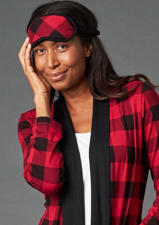 The Carly Sleep Mask filter out lights and other disturbances so that you can get the rest you need. Made from This Is J's ultra-soft and hand-printed fabric. Fits comfortably on all head sizes with a soft scrunch elastic band that goes around the back of the head.  Made in Canada.  Fabrication: 93% Viscose from Bamboo 7% Spandex. $35.00 red plaid