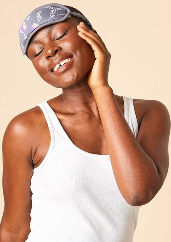 The Carly Sleep Mask filter out lights and other disturbances so that you can get the rest you need. Made from This Is J's ultra-soft and hand-printed fabric. Fits comfortably on all head sizes with a soft scrunch elastic band that goes around the back of the head.  Made in Canada.  Fabrication: 93% Viscose from Bamboo 7% Spandex. $35.00 charcoal with pink flowers