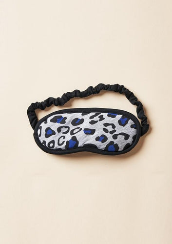 The Carly Sleep Mask filter out lights and other disturbances so that you can get the rest you need. Made from This Is J's ultra-soft and hand-printed fabric. Fits comfortably on all head sizes with a soft scrunch elastic band that goes around the back of the head.  Made in Canada.  Fabrication: 93% Viscose from Bamboo 7% Spandex. $35.00 grey leopard