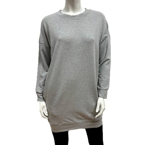 If you love a sweatshirt with a long line, you'll love this! The Farrah sweatshirt dress has a  banded neck and hemline, long sleeves and side slit pockets. Great worn as a tunic, it will be all you need to skip through autumn leaves in!  Proudly Made in Canada  Fabrication: 66% Bamboo, 28% Cotton, 6% Spandex  $135.00 Light Grey