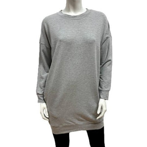If you love a sweatshirt with a long line, you'll love this! The Farrah sweatshirt dress has a  banded neck and hemline, long sleeves and side slit pockets. Great worn as a tunic, it will be all you need to skip through autumn leaves in!  Proudly Made in Canada  Fabrication: 66% Bamboo, 28% Cotton, 6% Spandex  $135.00 Light Grey