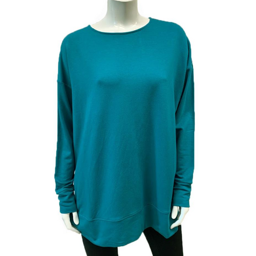 The Gabby Banded Tunic is a crew neck tunic with drop shoulders, step hemline and a straight cut for a more relaxed fit! This tunic will fit into any style story!  Proudly Made in Canada  Fabrication: 66% Bamboo, 28% Cotton, 6% Spandex  $105.00 Peacock Blue