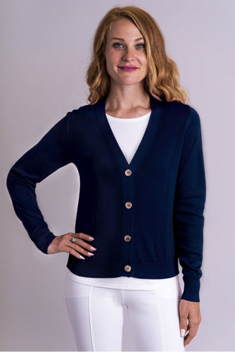 The Jessica Sweater is a layering piece in a universal shape. Deep V neckline, shell buttons, vents at hip for no cling. A perfect light sweater for over any look.  Fabrication: 50% Bamboo, 50% Cotton  BLUE SKY  Blue Sky fit guide - true to size for a relaxed finish $65.00 Indigo Blue
