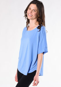 This is sure to be your favourite everyday tee. Casual and easy to slip on, the Laura Relaxed Fit Blouse features a relaxed fit body, curved hem detail, forward to front seams, and a universally flattering boat neck.  Fabrication: 95% Viscose from Bamboo 5% Spandex TERRERA $60.00 Periwinnkle Blue