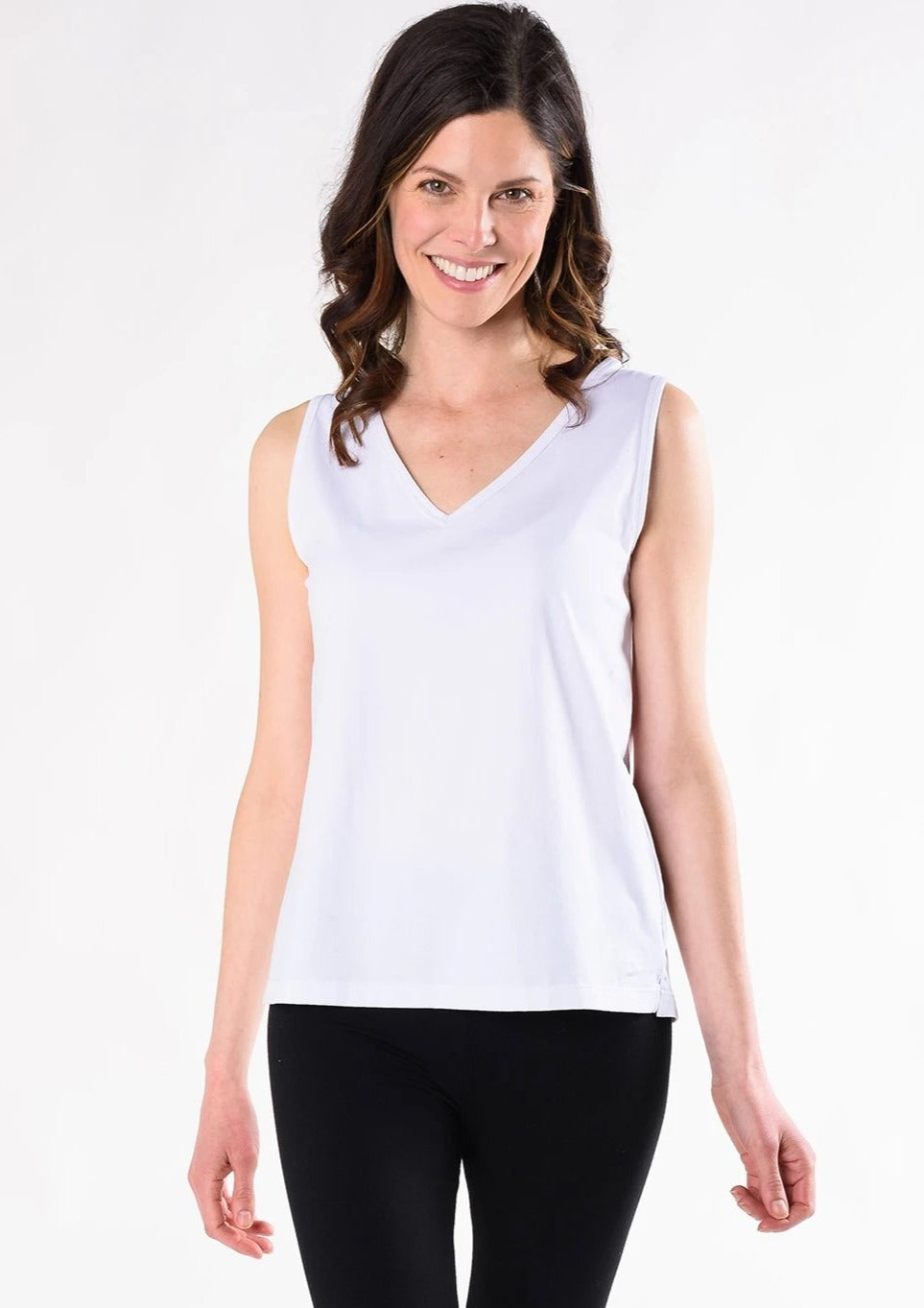 The Mandy Tank Top is a classic go-to tank top; updated with chic side slits and a flattering V-neck. Made with certified organic cotton so you know it’s good for the planet and for your skin. Wear it alone with jeans, or dress it up with a cardigan or jacket. Fabrication:  93% Organic Cotton, 7% Spandex TERRERA $50.00 Ivory White