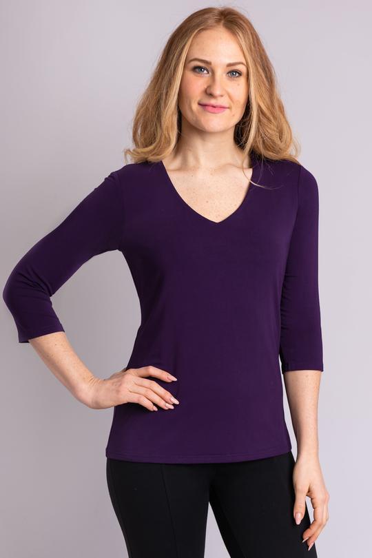 The Mia Top is made of stretchy Bamboo and has two layers in the front for added structure, flattering whether worn loose or body con. A soft V-neckline suggests a vertical axis and aligns with tapered shape down the body. T-shirt simplicity with a very shapely fit. Fabrication: 50% Bamboo, 42% Modal, 8% Lycra  BLUE SKY  Blue Sky fit guide - true to size $65.00 Royal Purple