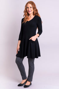 The Wilma Tunic's princess seaming allows for an easy fit over the upper body. A V-neckline suggests a vertical axis and adds a contemporary feel. The lower section falls from the high hip into a forgiving flare: the swing of fabric brings texture and movement around the hips.  Fabrication: 67% Bamboo, 28% Cotton, 5% Lycra.  BLUE SKY Blue Sky fit guide - true to size $85.00 Black