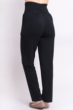 The Clair pant has a trouser fit great for all shapes and offer features we love. The wide self-fabric waistband can be worn high, medium, or low, for an easy fit. Tiny gathers below the waistband create a forgiving fullness around the hips, allowing the fabric to fall gently without pulling, and the classic tapered leg is a perfect style building block. Fabrication: 95% Bamboo, 5% Lycra  BLUE SKY  Blue Sky fit guide - generous; go down a size $75.00 Black