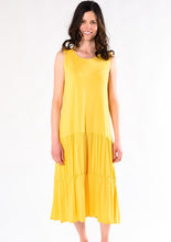 The Allison Maxi Dress is airy, breathable, and soft; a piece you’ll live in all summer long. With an A-line body and tiered panels that will make you want to twirl! On cooler evenings it looks great with a cardigan or a jean jacket. Fabrication: 95% Viscose from Bamboo 5% Spandex TERRERA $90.00 Marigold Yellow