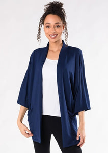 This elegantly oversized kimono cardigan can be worn year-round. The Cadence Cardigan is an open-front cardigan with billowy 3/4 length sleeves and patch pockets. It is just the right length for bum-coverage; style this with your favourite tee or tank top underneath.  Fabrication: 95% Viscose from Bamboo 5% Spandex French Terry TERRERA $115.00 Ink Blue