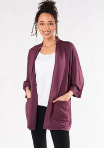 This elegantly oversized kimono cardigan can be worn year-round. The Cadence Cardigan is an open-front cardigan with billowy 3/4 length sleeves and patch pockets. It is just the right length for bum-coverage; style this with your favourite tee or tank top underneath.  Fabrication: 95% Viscose from Bamboo 5% Spandex French Terry TERRERA $115.00 Plum Purple