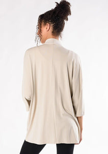 This elegantly oversized kimono cardigan can be worn year-round. The Cadence Cardigan is an open-front cardigan with billowy 3/4 length sleeves and patch pockets. It is just the right length for bum-coverage; style this with your favourite tee or tank top underneath.  Fabrication: 95% Viscose from Bamboo 5% Spandex French Terry TERRERA $115.00 Stone Brown
