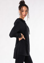 The Emily Tunic Hoodie is the perfect lounge piece. You can easily wear this hoodie with a pair of jeans or leggings. Made with dropped shoulder styling and soft hood with drawstrings, it also has side slits for added detail and movement. Fabrication: 95% Viscose from Bamboo 5% Spandex French Terry TERRERA $100.00 Black