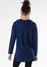 The Emily Tunic Hoodie is the perfect lounge piece. You can easily wear this hoodie with a pair of jeans or leggings. Made with dropped shoulder styling and soft hood with drawstrings, it also has side slits for added detail and movement. Fabrication: 95% Viscose from Bamboo 5% Spandex French Terry TERRERA $100.00 Ink Blue
