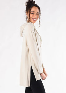 The Emily Tunic Hoodie is the perfect lounge piece. You can easily wear this hoodie with a pair of jeans or leggings. Made with dropped shoulder styling and soft hood with drawstrings, it also has side slits for added detail and movement. Fabrication: 95% Viscose from Bamboo 5% Spandex French Terry TERRERA $100 Stone Brown