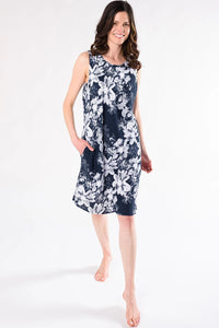  The June Floral Print dress has a scoop neck front, a V-neck back. Made with an easy to wear and smooth woven Tencel fabric that’s airy and breathable; it has an elegant seam detail running down the back.  Fabrication: 100% Tencel TERRERA $155.00 Ink Blue