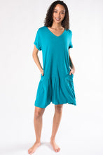 The Kendra dropped waist dress is both versatile and stylish; wear it as a dress or tunic! Wear alone or pair it with leggings, designed with a flattering V-neck, flounced hem, and a tunic silhouette that’s perfect for a casual day in or out. Fabrication: 95% Viscose from Bamboo 5% Spandex TERRERA $90.00 Turquoise Blue