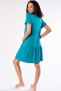 The Kendra dropped waist dress is both versatile and stylish; wear it as a dress or tunic! Wear alone or pair it with leggings, designed with a flattering V-neck, flounced hem, and a tunic silhouette that’s perfect for a casual day in or out. Fabrication: 95% Viscose from Bamboo 5% Spandex TERRERA Turquoise Blue