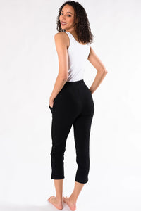 The Rochelle Side Split Capri are easy pull-on pants. Great for wearing to the office or lounging at home. They’re so comfortable that you’ll wonder if you’re still in your PJ’s. Made with a comfortable waistband, side pockets, and side slits to give you a classy and chic look. Fabrication: 95% Viscose from Bamboo 5% Spandex TERRERA $85.00 Black
