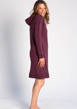 Slip into the Ariel Hoodie Dress with a pair of leggings for an effortless outfit this season. The Ariel Hoodie Dress has been designed with a styling front seam detail, a cozy hood, relaxed drop shoulder, and pockets to provide warmth, style, and practicality. TERRERA Colour Plum $115.00