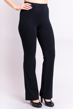 Create a slim line with the Aysha pant in cool bamboo and cotton. Narrow through hip and thigh, they have a slight flare to balance the silhouette. A light seam down front and back elongates and adds subtle texture. The fabric waistband at front and back combines with flat elastic at either side to ensure a smooth look and comfortable wear. Aysha pants provides freedom of movement with great contemporary style and a clean line.  Fabric - 67% Bamboo, 28% Cotton, 5% Lycra  BLUE SKY $$85.00 colour black