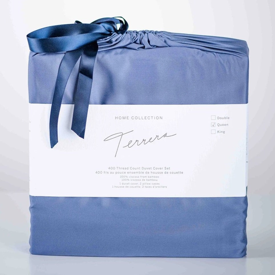 We spend one third of our lives in bed, so why not choose the best? Slip under the ultra-soft and cool-to-touch Terrera Luxury Duvet & Pillowcase Set. Made with their signature viscose from bamboo, which is comfortable, breathable, and oh so soft - an excellent option for those with sensitive skin. Includes 400 thread count Duvet Cover with snap closures at the bottom,4 ties inside to hold duvet in place and 2 pillow cases.  Fabrication: 100% Viscose from Bamboo TERRERA Mineral Blue $150/$160/$190 