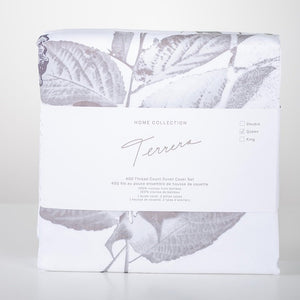 We spend one third of our lives in bed, so why not choose the best? Slip under the ultra-soft and cool-to-touch Terrera Luxury Duvet & Pillowcase Set. Made with their signature viscose from bamboo, which is comfortable, breathable, and oh so soft - an excellent option for those with sensitive skin. Includes 400 thread count Duvet Cover with snap closures at the bottom,4 ties inside to hold duvet in place and 2 pillow cases.  Fabrication: 100% Viscose from Bamboo White Bloom $180/$205/$230