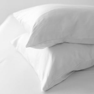 Lay your head on the ultra-soft Terrera Bamboo Pillowcase. Made with their signature eco-friendly bamboo viscose, which is naturally thermo-regulating and breathable - an excellent option for those with sensitive skin. The 400 Thread count guarantees you'll wake up feeling refreshed. (2/Set) Fabrication: 100% Certified Organic Viscose from Bamboo TERRERA White $30/$33