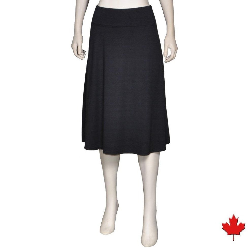 Bamboo Yoga Skirt is where style and comfort come together in a skirt. It has a yoke waist and multi-paneled flare that flows with every move. Made with soft Bamboo jersey that is luxurious, moisture wicking and breathable.  Proudly made in Canada Fabrication: 70% Rayon from Bamboo, 30% Cotton  Eco-Essentials $45.00 Black