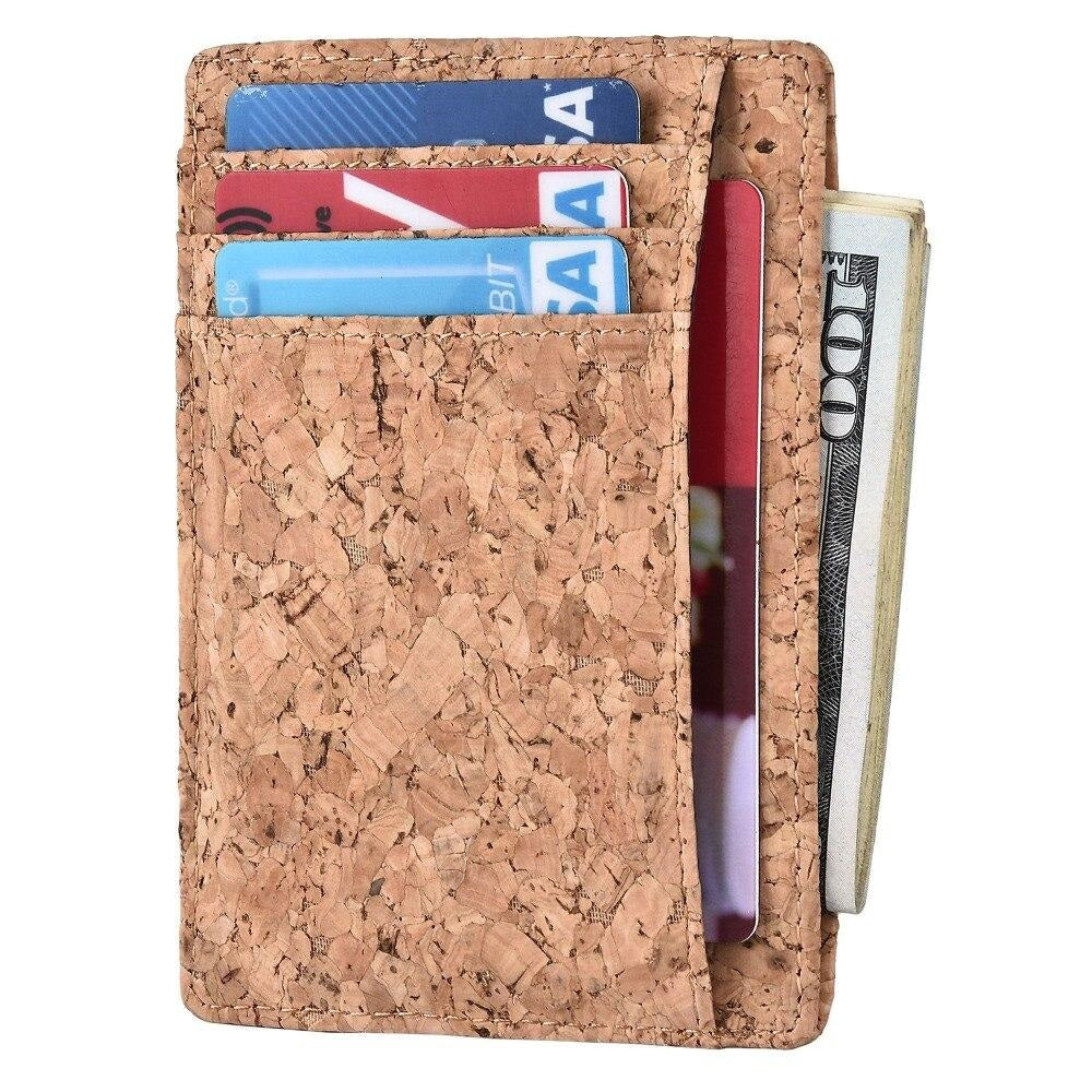 The Cork Card Holder is crafted from vegan and sustainable cork. This sleekly designed card holder features 6 card slots, 1 transparent holder for ID and a center slot for cash or more cards.  KUMA $34.00 colour natural