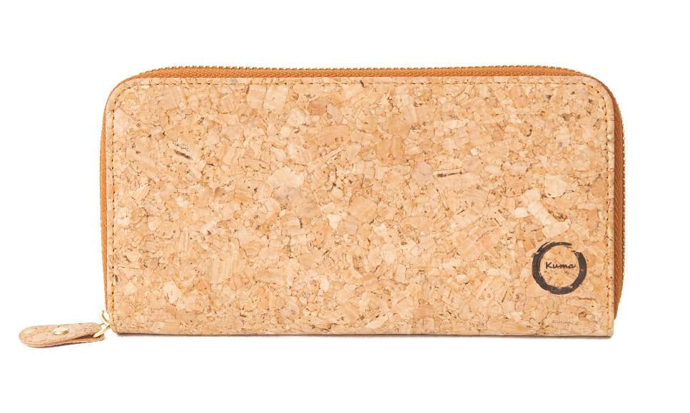 The sleek Cork Clutch is made with layered sustainable natural cork. With a zippered interior pocket  the cork clutch will fit your cash, coins, up to 24 cards and most cell phones! The sustainable accessory for coffee with an old friend or a night on the town.  KUMA $48.00 colour Naturel