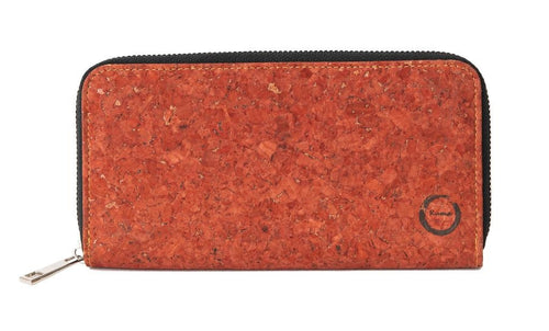 The sleek Cork Clutch is made with layered sustainable natural cork. With a zippered interior pocket  the cork clutch will fit your cash, coins, up to 24 cards and most cell phones! The sustainable accessory for coffee with an old friend or a night on the town.  KUMA $48.00 colour red