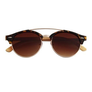  Meet Larch, our newest member to the KUMA Line! With its retro silhouette and delicate lines you will be sure to be seeing this stunner on the patios and beaches all year long! KUMA Plants a Tree for Every Pair Sold! 100% UVA/UVB protection Handcrafted Natural Bamboo Temples KUMA $35.00 Tortoise