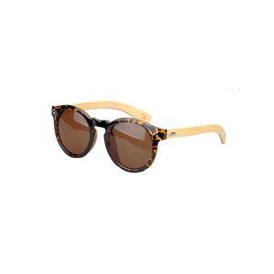 Kuma's Mango frame has a modern silhouette with a lineage rooted in the classics, the Mango's rounded frame and keyhole bridge detail matched with handcrafted natural bamboo temples bring this frame to a whole new level.  KUMA Plants a Tree for Every Pair Sold! 100% UVA/UVB protection Handcrafted Natural Bamboo Temples KUMA $35.00 Tortoise