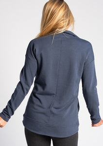 For any occasion lounging or outdoor hikes, the Naomi Half-Zip Sweater will ensure that you stay warm and cozy. It's made with our earth-friendly bamboo fleece that provides natural insulation to the body. The relaxed shoulder and curved hemline make this sweater ultra-flattering and non-bulky.  Fabrication: 66% Viscose from bamboo, 28% Cotton, 6% Spandex TERRERA $110.00 colour anchor blue