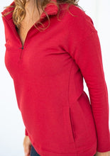 For any occasion lounging or outdoor hikes, the Naomi Half-Zip Sweater will ensure that you stay warm and cozy. It's made with our earth-friendly bamboo fleece that provides natural insulation to the body. The relaxed shoulder and curved hemline make this sweater ultra-flattering and non-bulky.  Fabrication: 66% Viscose from bamboo, 28% Cotton, 6% Spandex TERRERA $110 colour Ruby Red