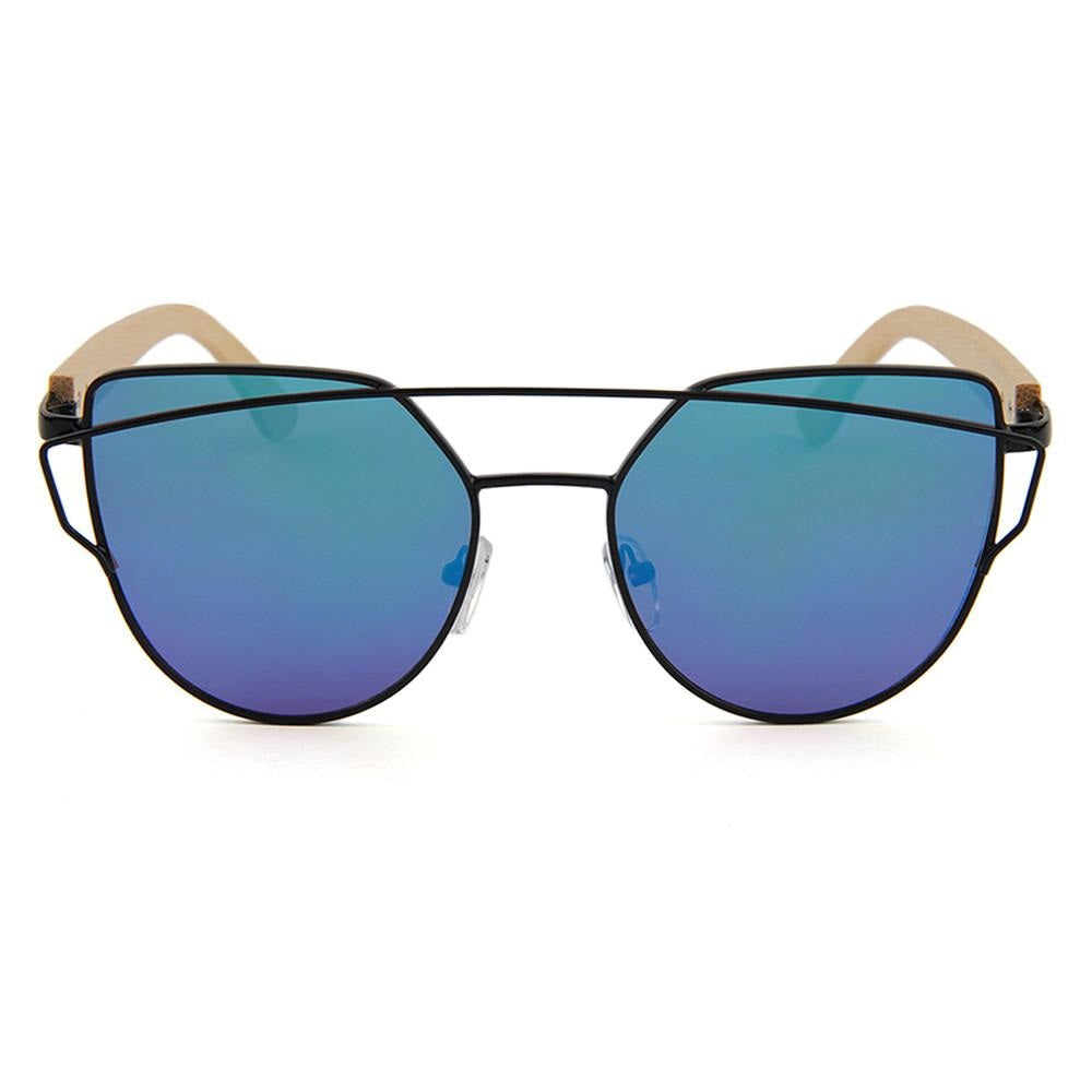 Inspired by the flat leaves and delicate but strong branches of the Olive tree the timeless design of our Olive Sunglasses with its delicate lines and flat mirrored lens hearkens back to an earlier time all while embodying fashion forward design and natural elements!  KUMA Plants a Tree for Every Pair Sold! 100% UVA/UVB protection Handcrafted Natural Bamboo Temples KUMA $35.00 Blue Mirrored