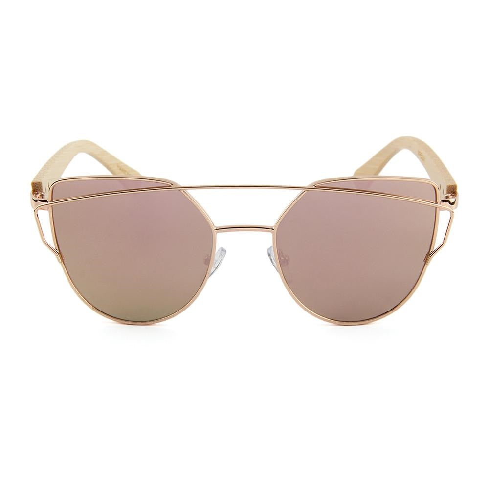 Inspired by the flat leaves and delicate but strong branches of the Olive tree the timeless design of our Olive Sunglasses with its delicate lines and flat mirrored lens hearkens back to an earlier time all while embodying fashion forward design and natural elements!  KUMA Plants a Tree for Every Pair Sold! 100% UVA/UVB protection Handcrafted Natural Bamboo Temples KUMA $35.00 Rose Gold
