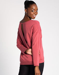 Simple on the front, totally unique on the back! The Riley Crossover Sweater has cross-over panels as well as a keyhole detail on the back. Made this with a cozy bamboo fleece fabric that provides natural insulation to the body.   Fabrication: 66% Viscose from bamboo, 28% Cotton, 6% Spandex TERRERA $95.00 colour Deep Rose Pink