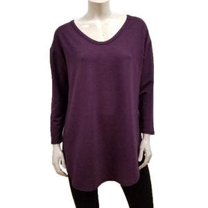 The Tori Tunic has a soft banded V-neckline, 3/4 sleeves, slight A-line shape, and a softly rounded hemline make this the best tunic for your weekends! Or, any day-ends!   Proudly Made in Canada  Fabrication: 66% Bamboo, 28% Cotton, 6% Spandex  GILMOUR   $95.00 colour plum purple