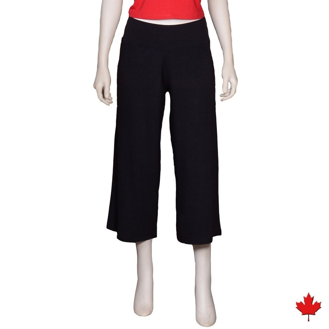 The Della Wide Leg Capri pants are light weight and flowy, with a yoga style waistband.  They are soft and breathable with a wide leg that hits about mid-calf, great for any summer day or Taking with you on all your travels. Proudly Made in Canada Fabrication: 66% Rayon from Bamboo 28% Cotton 6% Spandex ECO-ESSENTIALS Black $60.00