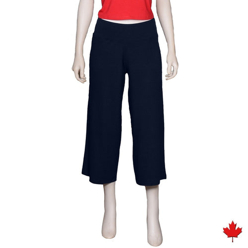 The Della Wide Leg Capri pants are light weight and flowy, with a yoga style waistband.  They are soft and breathable with a wide leg that hits about mid-calf, great for any summer day or Taking with you on all your travels. Proudly Made in Canada Fabrication: 66% Rayon from Bamboo 28% Cotton 6% Spandex ECO-ESSENTIALS $60.00 Navy Blue