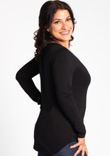 ﻿The beautiful Charis top is classic fit long-sleeve t-shirt featuring a flattering scoop neckline. The curved hemlines on the bottom elongate the body and provide ample coverage. Wear on its own or under a cardigan for added warmth! Fabrication: 95% Viscose from Bamboo 5% Spandex TERRERA Colour black $60.00