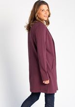 The Meghan Blazer will take you from work to the weekend. This beautifully crafted   open-front blazer with a cozy and warm bamboo fleece fabric that feels as soft as your favorite PJs. This long sleeve sweater blazer with pockets will be your staple piece this season. Fabrication: 66% Viscose from bamboo, 28% Cotton, 6% Spandex TERRERA color plum purple $135.00