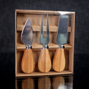 Cheese Cutting Utensils with Bamboo handles. Set includes fork, Sharp edged spreader and sharp edged server. VERDICI $20.00