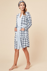 For lounging, getting ready to start your day or even ending it, this soft and breathable Shannon bamboo robe is what you'll always want to be wrapped up in. This robe features deep pockets, a long belt, wide lapel to adjust the way you wrap the robe around your body, and a matching headband. Made from our signature moisture wicking bamboo/spandex fabric. Proudly Made in Canada Fabrication 93% Bamboo Viscose 7% Spandex This Is J Colour Blue Hatch