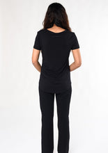 Your basic comfy tee, Brenda U Neck is easy-going, with all the right features: flattering U-neck line, classic-soft viscose from bamboo jersey, high-low hem for extra coverage at the back. Pair it with leggings for working out, jeans for staying casual. Fabrication: 95% Viscose from Bamboo 5% Spandex Terrera $50.00 Black